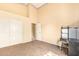 Bedroom with neutral carpet features vaulted ceilings and closet at 251 E Arabian Dr, Gilbert, AZ 85296
