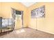 Cozy bedroom with a window, desk, and carpeting at 251 E Arabian Dr, Gilbert, AZ 85296