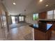 Kitchen view open to a living space with a sliding glass door to the outside at 26747 W Pontiac Dr, Buckeye, AZ 85396