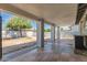 A covered back patio with concrete pillars and a view of the yard and surrounding neighborhood at 2908 N 54Th Dr, Phoenix, AZ 85031