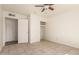 Bedroom with tiled floors, ceiling fan and closet at 2908 N 54Th Dr, Phoenix, AZ 85031