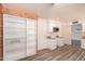 Well-appointed kitchen with sleek white cabinets and modern microwave at 2908 N 54Th Dr, Phoenix, AZ 85031