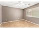Neutral bedroom with tiled floors and a bright window at 3006 W Matthew Dr, Phoenix, AZ 85027