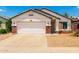 Charming single-story home with a two-car garage, low maintenance landscaping, and beautiful Southwestern design at 3006 W Matthew Dr, Phoenix, AZ 85027
