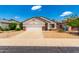 Charming single Gathering home featuring a two-car garage and low maintenance desert landscaping at 3006 W Matthew Dr, Phoenix, AZ 85027