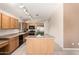 Well-lit kitchen featuring a center island and stainless steel appliances at 3006 W Matthew Dr, Phoenix, AZ 85027
