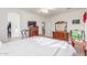 Spacious Primary bedroom with a large dresser and access to a closet at 3025 N Desert Horizons Ln, Casa Grande, AZ 85122