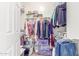 Walk-in closet with shelving and room for hanging clothes and storing personal items at 3025 N Desert Horizons Ln, Casa Grande, AZ 85122