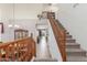 Spacious foyer with high ceilings, a staircase, tile floors, and views into the dining and living areas at 3025 N Desert Horizons Ln, Casa Grande, AZ 85122