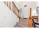 Entryway with wood railing staircase, tile floor, light walls and a front door with side window at 3025 N Desert Horizons Ln, Casa Grande, AZ 85122