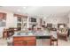 Open-concept kitchen, stainless appliances, and adjacent living area, great for entertaining at 3025 N Desert Horizons Ln, Casa Grande, AZ 85122