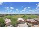 Panoramic aerial view of a residential neighborhood, showcasing lush green space nearby at 3586 S Moccasin Trl, Gilbert, AZ 85297