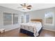 Bedroom with hardwood floors and large windows providing ample natural light at 3586 S Moccasin Trl, Gilbert, AZ 85297