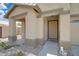 Inviting front entrance with a covered porch and desert-friendly landscaping at 3586 S Moccasin Trl, Gilbert, AZ 85297