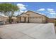 Charming single-story home with a two-car garage and well-maintained desert landscaping at 3586 S Moccasin Trl, Gilbert, AZ 85297