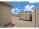 Backyard shed that offers outdoor storage, enclosed with block fencing at 3586 S Moccasin Trl, Gilbert, AZ 85297