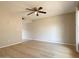 Spacious living room featuring a ceiling fan and modern flooring for a comfortable living space at 3840 N 43Rd Ave # 34, Phoenix, AZ 85031