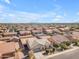 A beautiful view of the house and neighborhood featuring single-Gathering homes at 40657 W Somers Dr, Maricopa, AZ 85138