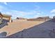 This expansive backyard has plenty of space, and the block fence ensures maximum privacy at 40657 W Somers Dr, Maricopa, AZ 85138