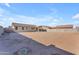 Huge backyard area with plenty of space offers potential for landscaping and customization at 40657 W Somers Dr, Maricopa, AZ 85138