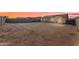 Expansive backyard offering endless possibilities for customization and outdoor enjoyment at 40657 W Somers Dr, Maricopa, AZ 85138