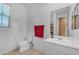 Bright bathroom features a single sink vanity at 40657 W Somers Dr, Maricopa, AZ 85138