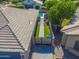 An aerial shot of the home's backyard featuring a sparkling pool and well-maintained surroundings at 4236 S John Way, Chandler, AZ 85249