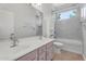 Bathroom with double vanity sink and shower/tub combo at 4236 S John Way, Chandler, AZ 85249