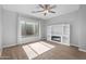 Comfortable bedroom featuring a fireplace, built-in shelving, and ample natural light for a relaxing retreat at 4236 S John Way, Chandler, AZ 85249