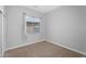 Neutral bedroom with window, carpet, and curtains at 4236 S John Way, Chandler, AZ 85249