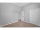 Neutral bedroom with carpet and double closet doors at 4236 S John Way, Chandler, AZ 85249
