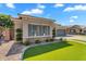 Charming single-story home featuring a well-manicured lawn, stone accents, and a two-car garage in a desirable neighborhood at 4236 S John Way, Chandler, AZ 85249