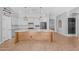 Open-concept kitchen with large island, stainless steel appliances, and seamless flow to living spaces at 4236 S John Way, Chandler, AZ 85249