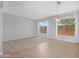Bright, open living area featuring tile flooring, neutral walls, and a modern light fixture at 4236 S John Way, Chandler, AZ 85249