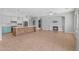 Expansive living area showcases a fireplace and connects seamlessly to an open-concept kitchen at 4236 S John Way, Chandler, AZ 85249