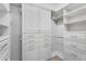 Organized walk-in closet with custom shelving and ample storage space at 4236 S John Way, Chandler, AZ 85249