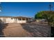 Enjoy outdoor living in the spacious backyard, complete with a covered patio and mature trees providing ample shade at 434 N 56Th St, Mesa, AZ 85205