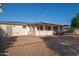 The property has a spacious backyard with a covered patio, offering an ideal setting for outdoor living at 434 N 56Th St, Mesa, AZ 85205