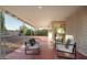 Relaxing covered patio featuring comfortable outdoor seating, offering an inviting space for leisure and entertainment at 434 N 56Th St, Mesa, AZ 85205