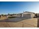 Charming single-story home featuring a low maintenance yard and a wide driveway leading to a two-car garage at 434 N 56Th St, Mesa, AZ 85205