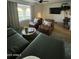 Inviting living room with large windows, comfortable seating, and contemporary decor at 434 N 56Th St, Mesa, AZ 85205