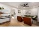 Spacious living room featuring contemporary decor, wood-look flooring, and stylish furniture at 434 N 56Th St, Mesa, AZ 85205