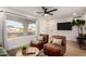 Inviting living room featuring contemporary decor, wood-look flooring, and stylish furniture at 434 N 56Th St, Mesa, AZ 85205