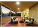 Outdoor covered patio features comfortable seating arrangements for relaxation and social gatherings at 434 N 56Th St, Mesa, AZ 85205