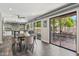 Open dining area connects to a modern kitchen and offers views of the backyard patio at 438 E Larkspur Ln, Tempe, AZ 85288
