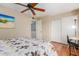 Comfortable bedroom with ceiling fan, closet, and desk, perfect for relaxing and working at 4600 N 68Th St # 379, Scottsdale, AZ 85251