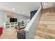 Inviting living room with tiled floors, stairs, and a comfortable seating area bathed in natural light at 4600 N 68Th St # 379, Scottsdale, AZ 85251