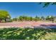 The community basketball court invites residents to enjoy outdoor activity and friendly competition at 4711 E Buckboard Ct, Gilbert, AZ 85297