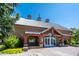 Exterior of community clubhouse with welcoming entrance and architectural details at 4711 E Buckboard Ct, Gilbert, AZ 85297