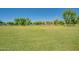 Expansive community open field, perfect for recreational activities and enjoying the outdoors at 4711 E Buckboard Ct, Gilbert, AZ 85297